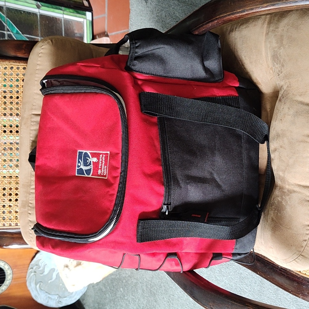 Large soft cooler with two water bottle holders and front zippered pocket